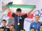 تکنوادوکار قمی مدال جهانی خود را به آستان مقدس قم اهدا کرد
