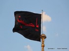 :گزارش تصویری: نصب پرچم حرم امام حسین(ع) روی گنبد حرم حضرت معصومه(س)  